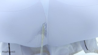 Exhibitionist Babe Peeing through leggings in snow