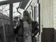 Preview 1 of A mature fat milf smokes and shows her tits and pussy in the courtyard of an abandoned house.