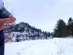 Two big cumshots in a snowy nature
