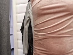 in the dressing room, with the curtain open, I change my clothes