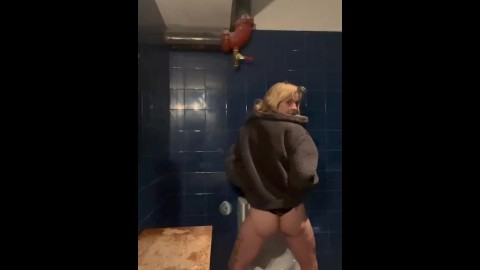 Cute blonde alt girl pisses in public urinal