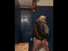 Cute blonde alt girl pisses in public urinal