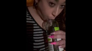 Deepthroating a wine bottle for clout lol