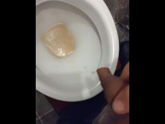 Piss into toilet