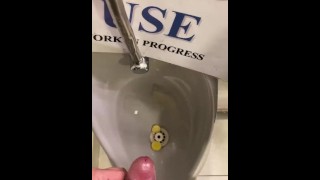 Destructive pissing in public urinal