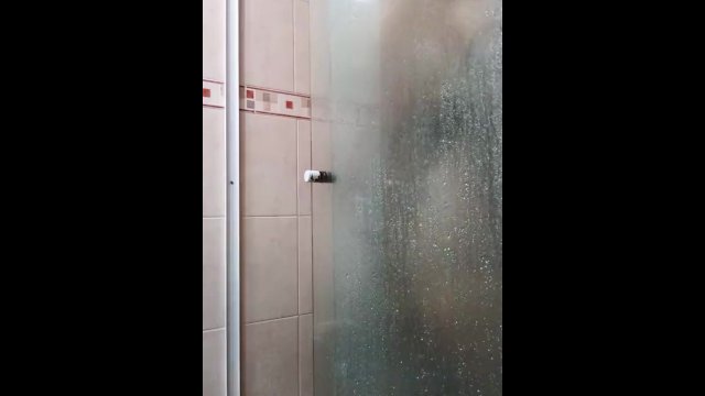 I fuck with two strange lesbians in a public shower and dildos