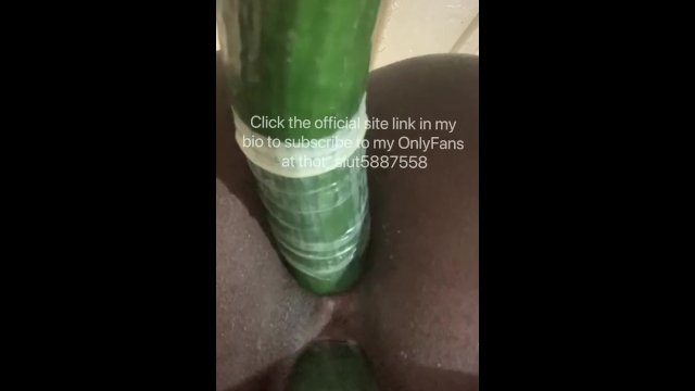Ebony gets fucked with 2cucumbers at once
