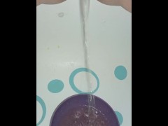 Filling up a bowl of piss for Daddy