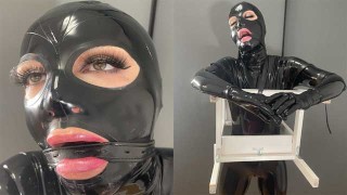The BDSM Couple Dressed In Rubber Catsuits And Latex Ties Up Their Submissive Slave Gagged In Bondage