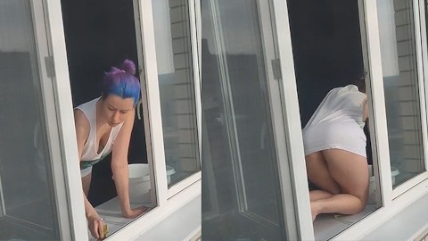 A neighbor girl washes windows without a bra and panties