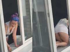 A neighbor girl washes windows without a bra and panties