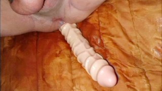 Homo Kotilainen using big dildo in his asshole