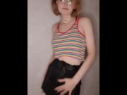 Preview 1 of A beautiful girl in a colorful T-shirt dances in front of the camera
