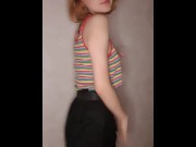 Preview 2 of A beautiful girl in a colorful T-shirt dances in front of the camera