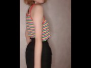 Preview 3 of A beautiful girl in a colorful T-shirt dances in front of the camera