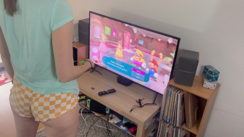 Having fun in a virtual game in tight shorts
