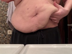 A man's huge belly was shown without a T-shirt