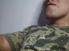 soldier is left alone while his companions went out and he masturbates and cums a huge load on his b