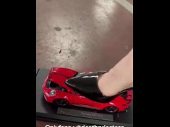 sexy girl crushes car toys with heels