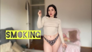 Sexy tattooed model smokes Marlboro Red