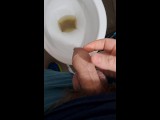 bearded hipster male pissing
