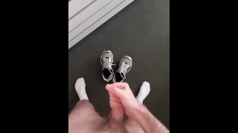 Skinny hairy guy wanks a dick in his room looking at sneakers