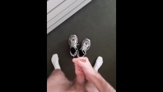 Skinny hairy guy wanks a dick in his room looking at sneakers