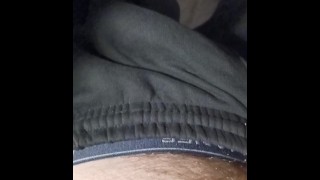 Stroking bulge sweat pants, showing pre cum and getting finished by the wife