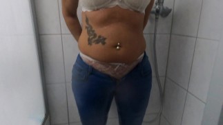 Pissing in jeans then taking a shower