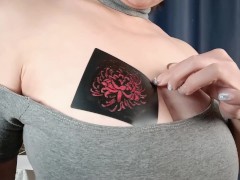 Sexy busty beauty tries temporary flower tattoo - ASMR