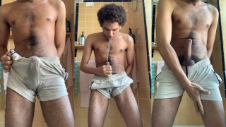 Hairy boy rubs, pees shorts and cums after