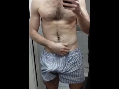 Hot guy strocking his huge cock in front of a mirror !