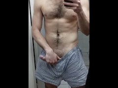 Hot guy strocking his huge cock in front of a mirror !