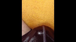 Wetting compilation sitting on some towels in different outfits