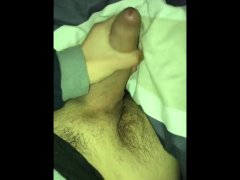 I am wanking my thick cock while  watching TV