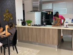 Aisha Fucks her friend in the kitchen while her family is at the table
