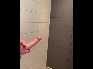 Quick jerking off and huge cumshot at public toilet