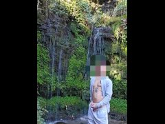 Playing with my big hard cock next to waterfall