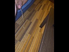 Piss on carpet laying on couch in hotel