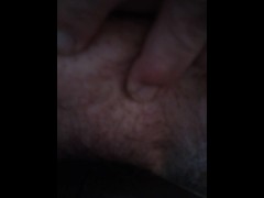 Grinding clit on table corner outside close up