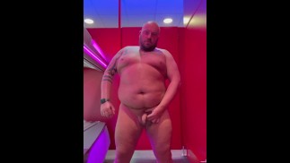 Posing for photos in the tanning salon, naked!