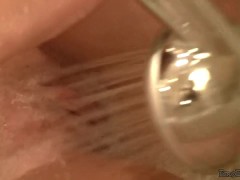 Emo Emily Rubbing shower on her pussy