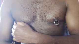 Black man playing with nipples and cumming