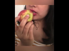 Red lips and an apple