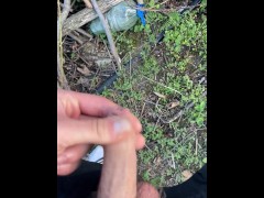 Long dick pissing in the woods