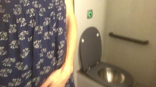 She touches herself and cums in the train toilet