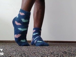 Arched feet in blue socks Video