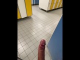 Risky cumshot in public swimming pool changing room!