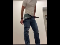 Pissing in a condom and pouring it on my face in public restroom - Slow motion