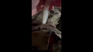 Horny army soldier jerks off and fills a condom!